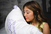 image of women holding Lavender pillow
